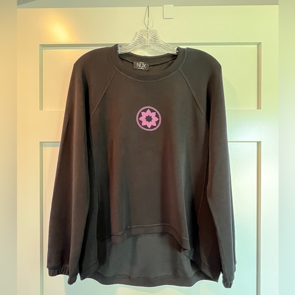 Club Pilates elliptical sweatshirt. Black with purple. Only worn once. Size XL.